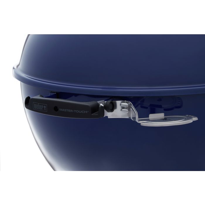 Ergonomiczny czarny uchwyt, na którym widnieje napis: Weber, Master-Touch. 